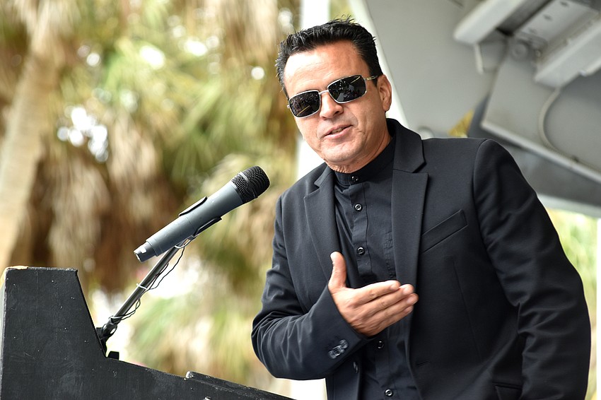 Ivan Espana addresses the crowd during the induction ceremony.