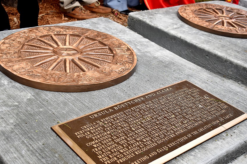 The plaques surround St. Armand Circles Park.