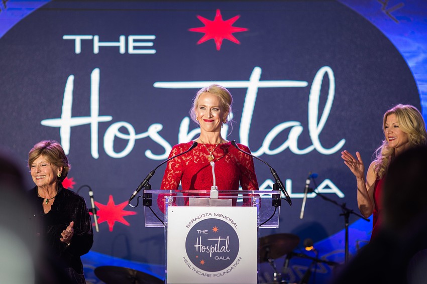 Co-Chairwoman Ariane Dart gives a welcome speech.