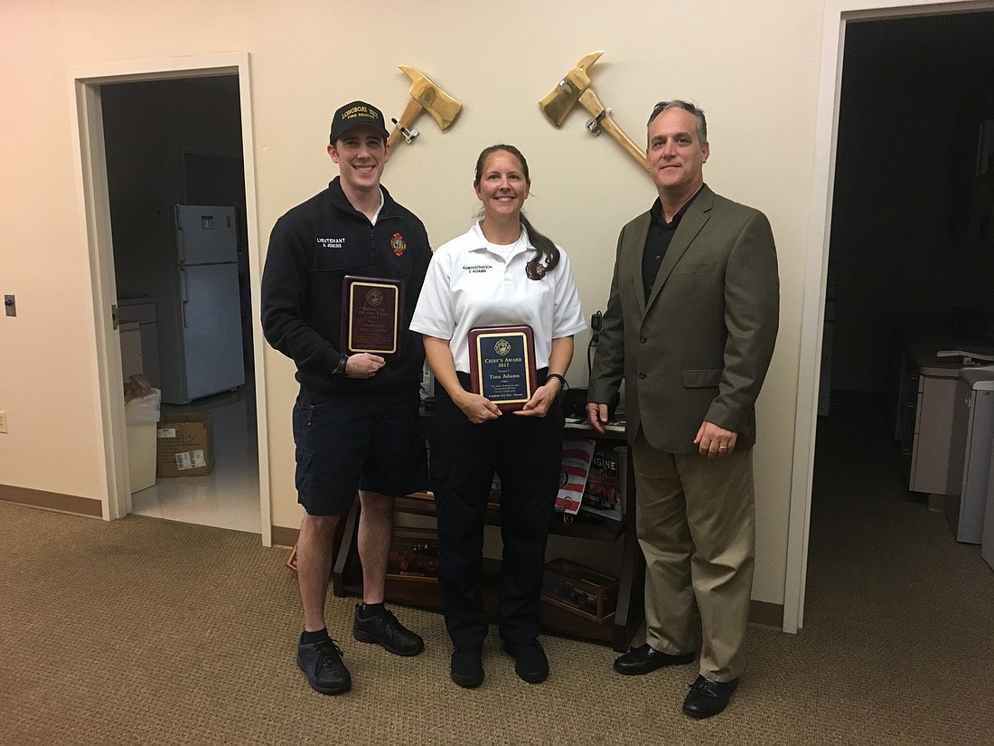 Lt. Alan Jenkins received the Officer of the Year Award and Tina Adams received the Chief&#39;s Award.  Courtesy photo