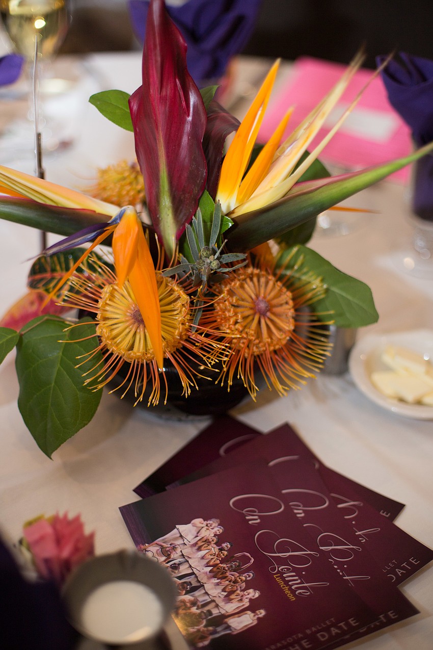 The tropical flower centerpieces on the tables of Michael's On East.