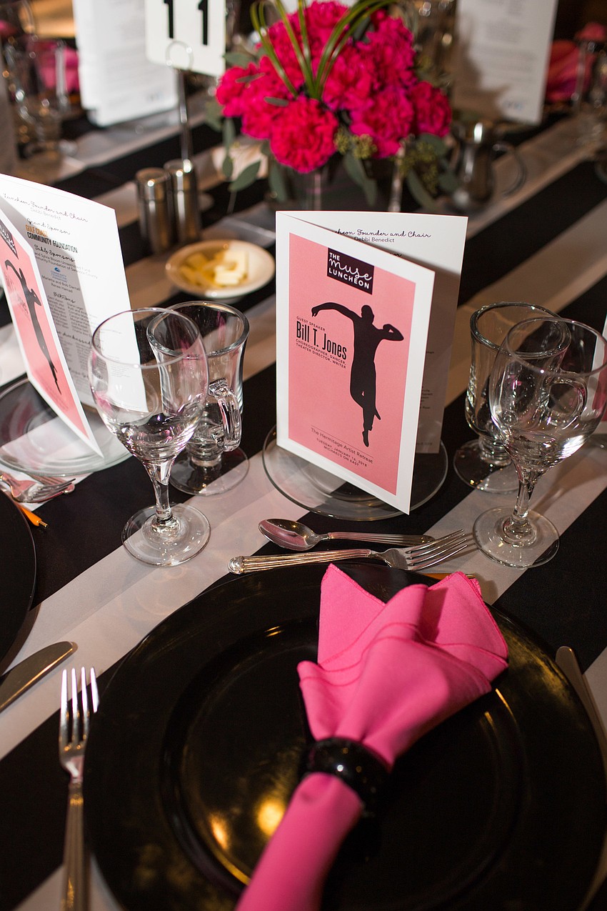 The tables were themed with pink napkins and brochures.
