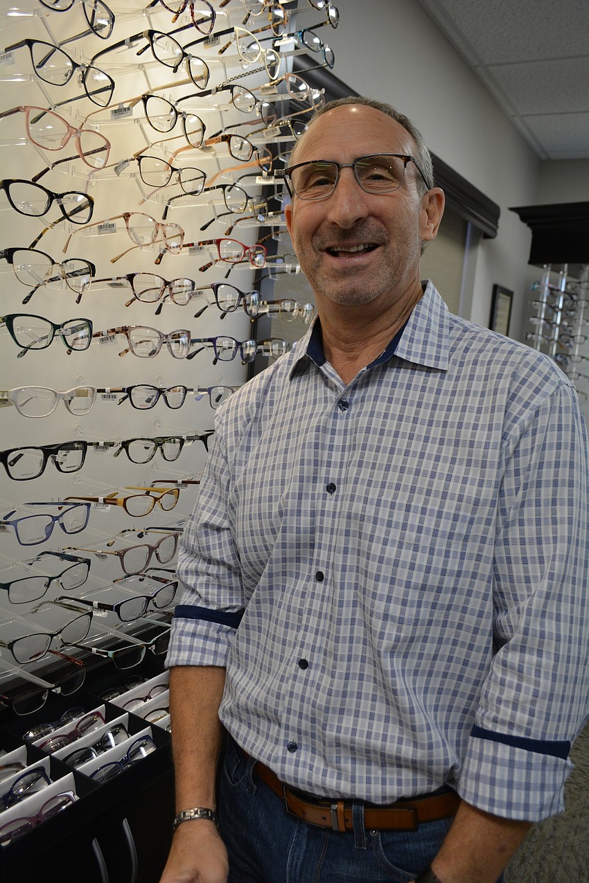 Safilo sales representative Leo Schuster helped organize a trunk show of designer glasses frames.