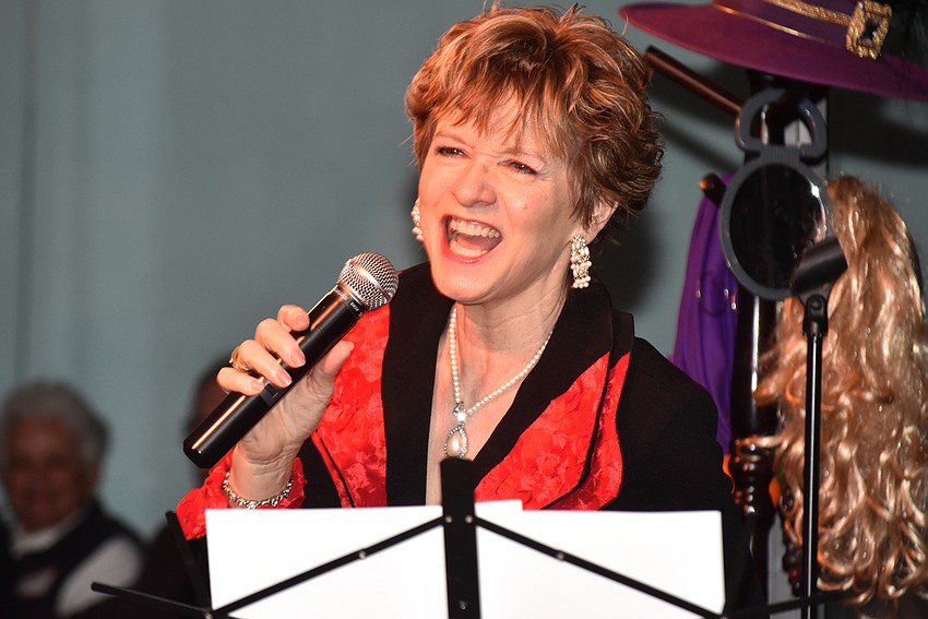 Marcy Downey opens her cabaret concert for 100 Seaplace residents.