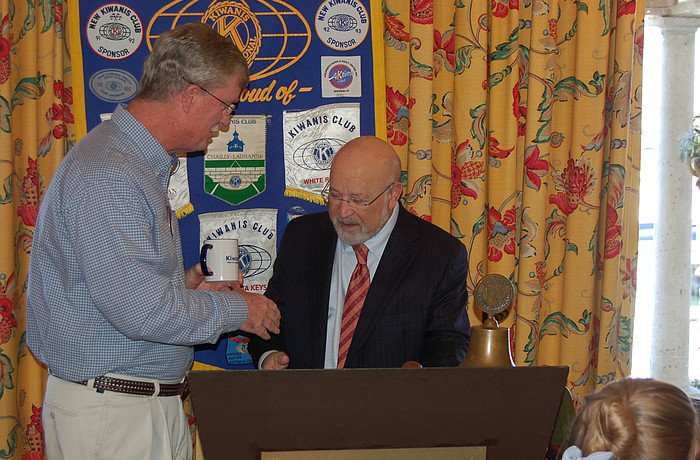 Steve Branham thanks David Kotok for his speaking engagement at the Longboat Key Kiwanis Club&#39;s lunch meeting on Thursday, Jan. 18.