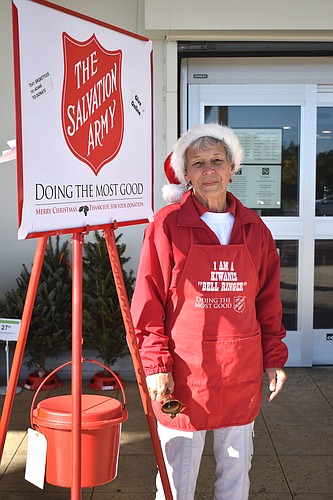 Jane Boehme takes a turn ringing the bell at the Kiwanis Club&#39;s holiday-season kettle drive for the Salvation Army.