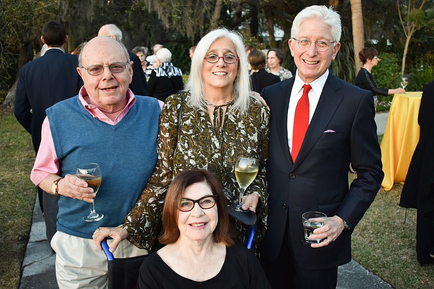 Michael and Sherle (seated) Berger, Carmen Baskind and James Snyder