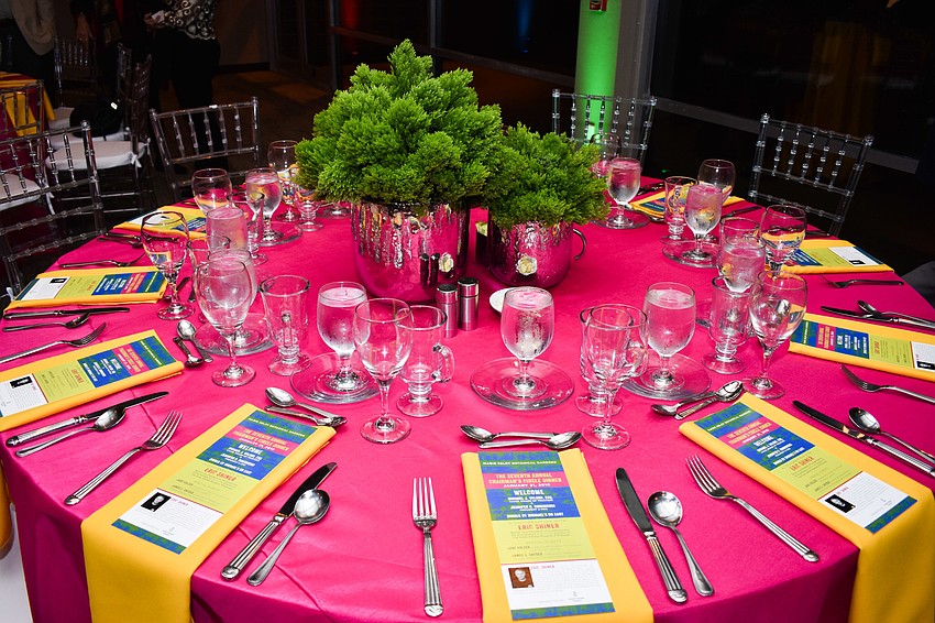 Table settings reflected the bright and bold colors that will be abundant at the gardens’ next exhibit, “Warhol: Flowers in the Factory.”