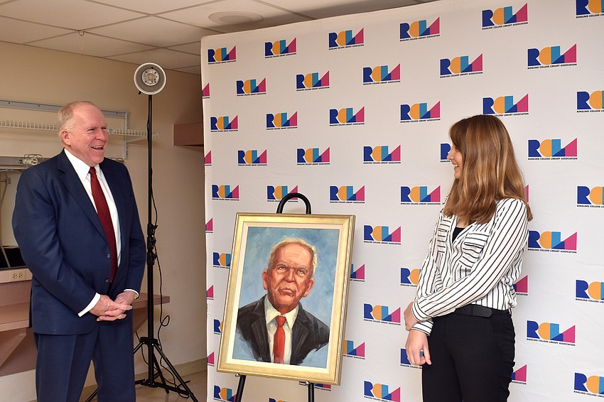 Former CIA Director John Brennan smiles as his portrait, done by Ringling senior Laren Dellapa, is unveiled.