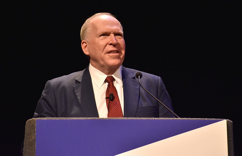 Former CIA Director John Brennan addresses the crowd during his lecture at the Van Wezel Performing Arts Hall.