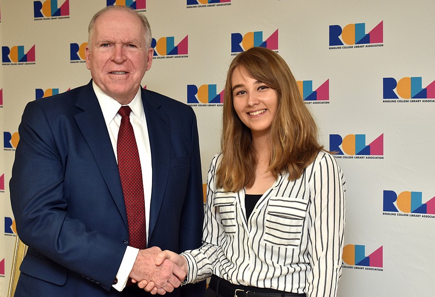 Former CIA Director John Brennan and Ringling College of Art and Design senior Lauren Dellapa