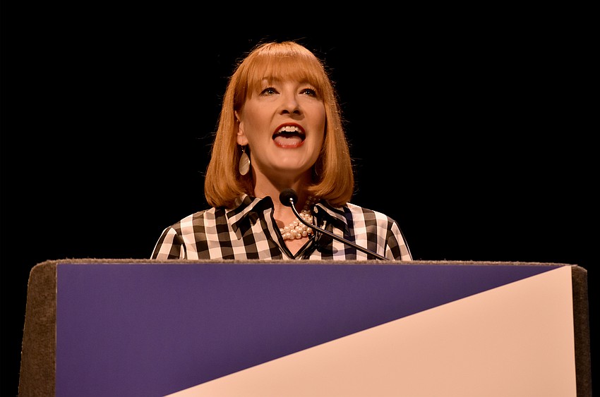 RCLA Town Hall Chairwoman Emily Walsh welcomes the crowd to the first lecture in the series on Jan. 22.