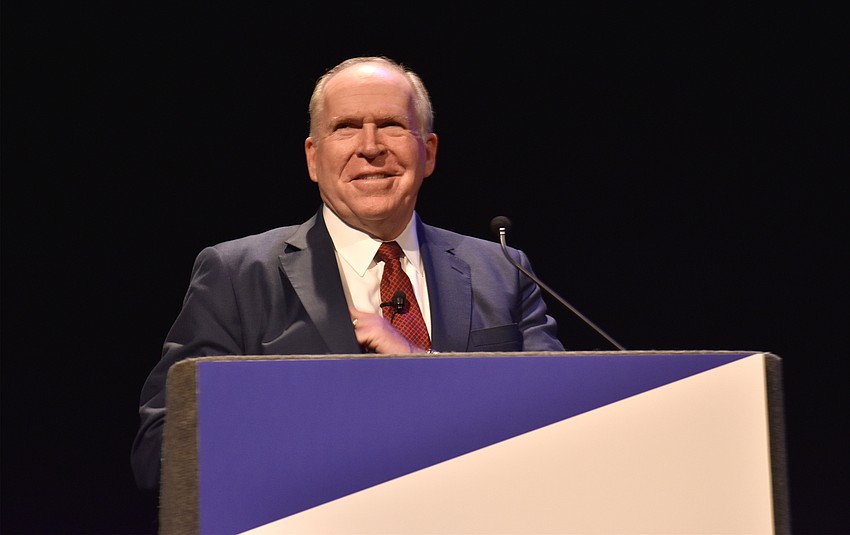Former CIA Director John Brennan laughs with the crowd during the first lecture in this year’s RCLA Town Hall Lecture Series.