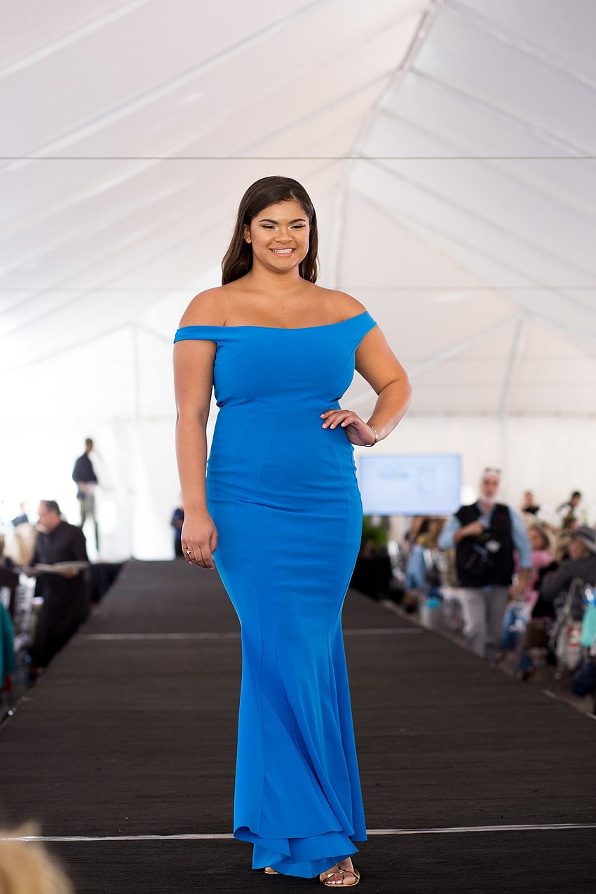 Giavanna Solomon poses for a photo at the end of the runway.