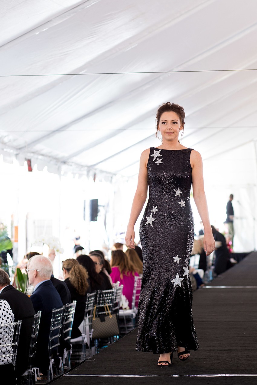 Model Rebecca models a unique gown from Rent The Runway.