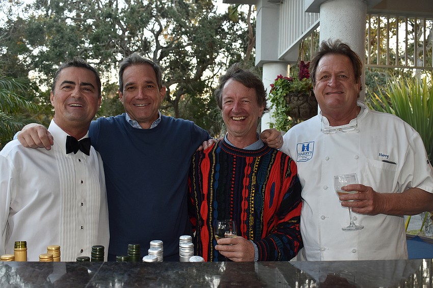 “Storyteller” bartender Sam Lastinger with Dave Odenath, Mike Seamon and Harry Christensen