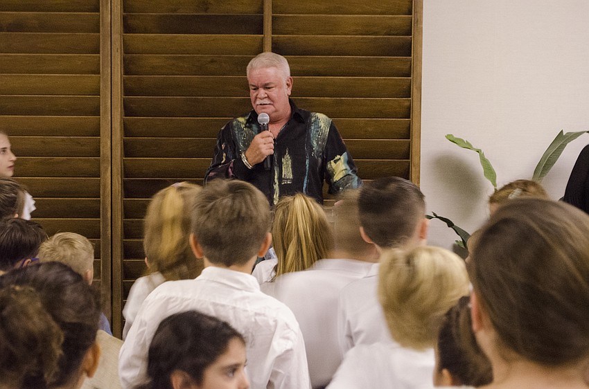 The students gathered to listen to what Principal Steven Dragon had to say.