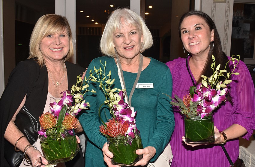 Vicki White, Ashley Garcia and the centerpieces attendees could take home