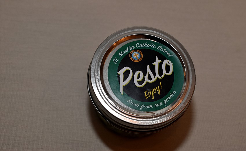 Last year, the Longboat Key Garden Club gave St. Martha Catholic School a grant. In thanks, the school provided pesto, made from ingredients in the school’s garden, to be given away at the event.