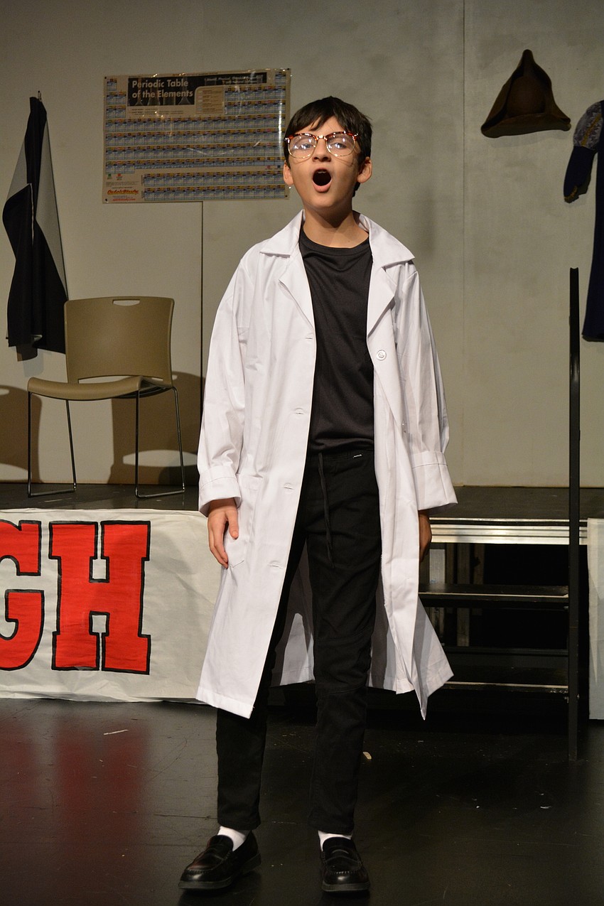 Middle Schooler Joseph Clarke sings as a member of East High's academic team.