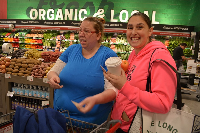 East County residents Lindsey Rezin and Joy Hill were first in line. They arrived at midnight and used the night to hang out away from their collective 11 children.