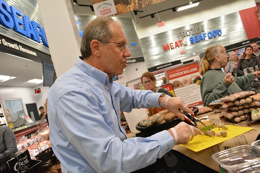 Steve Schonwetter cooks up Bilinski's brand no-casing chicken sausage for patrons to taste.