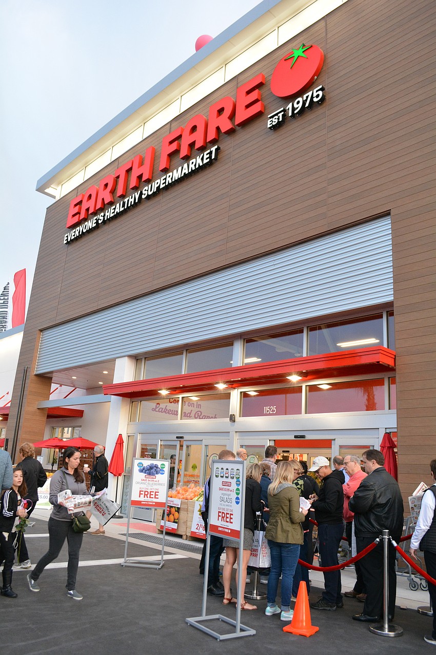 Earth Fare's opening included music by the Lakewood Ranch High School band, a ribbon-cutting ceremony and voucher give-aways. About 900 people were in line before 7 a.m.