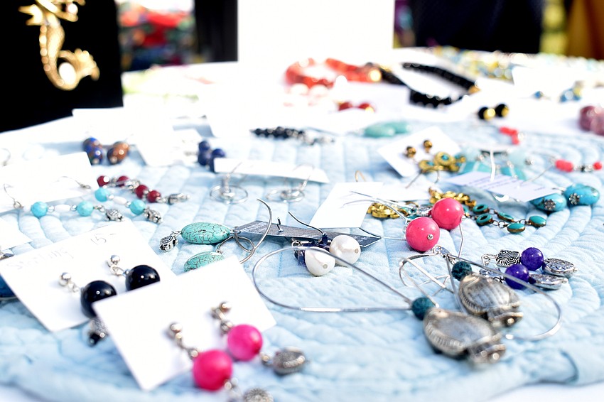 Jewelry designed and made by Sue Reese were for sale during L’Art Festival.