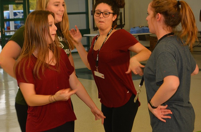 Renee Ashby, Angela Baldino, Jules Catina and Cameron Auk practices their moves before the dance marathon.