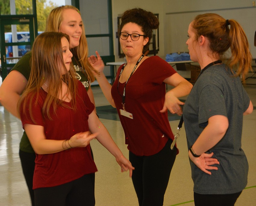 Renee Ashby, Angela Baldino, Jules Catina and Cameron Auk practices their moves before the dance marathon.