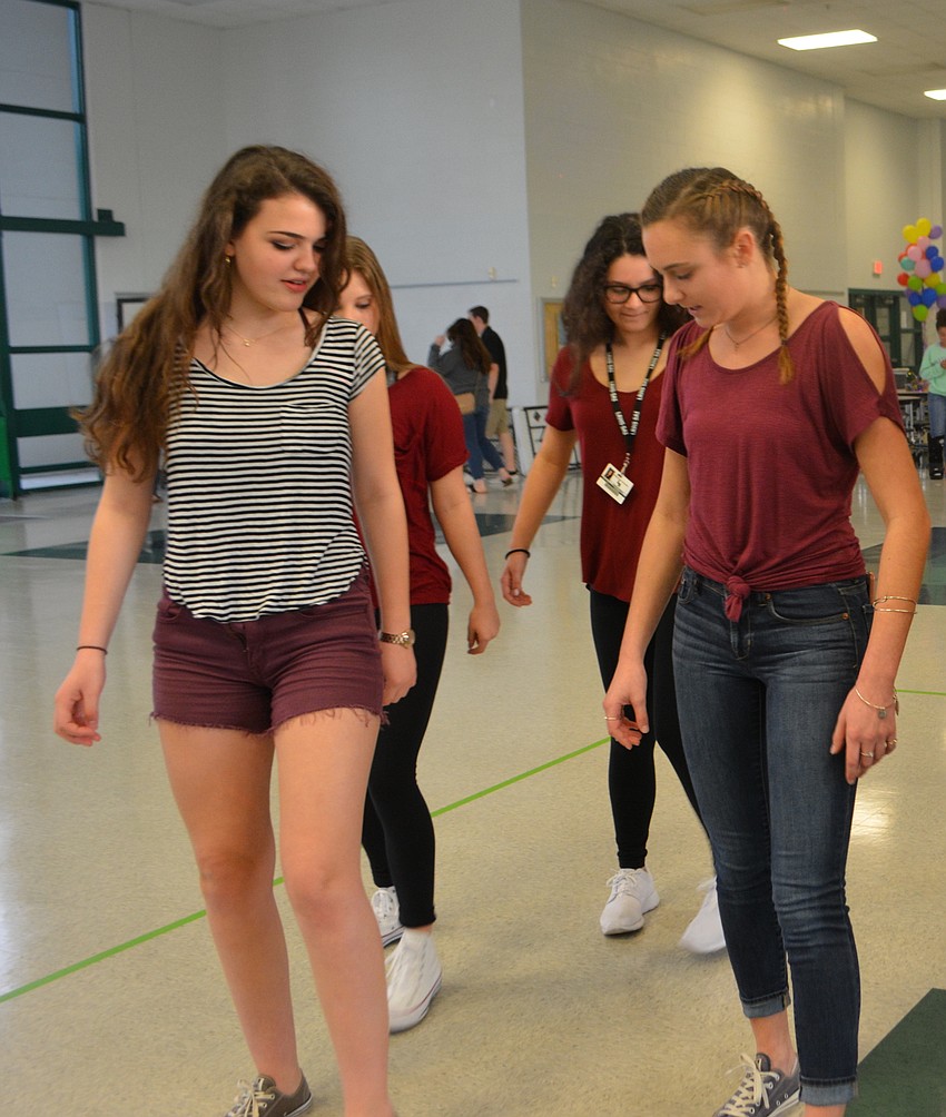 Sofia Gonzalez and Chelsea Petruzzi participate in the dance marathon.