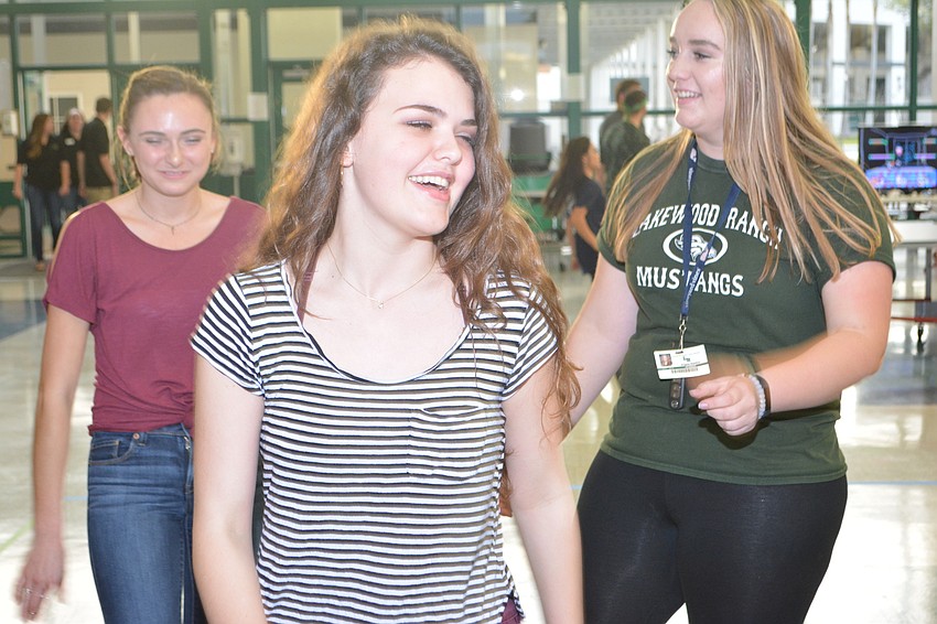 Chelsea Petruzzi, Sofia Gonzalez and Angela Baldino help raise funds for Shriners Hospital.