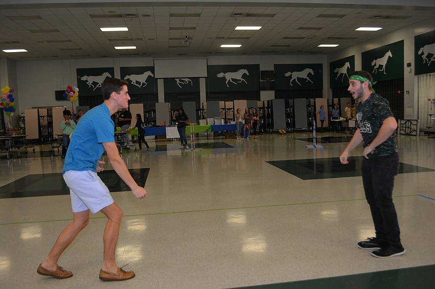 Lakewood Ranch High student Joe Maier and University of South Florida student Bryan Stark face off during the dance marathon.