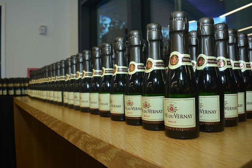 Event guests took home a bottle of champagne as a parting gift.