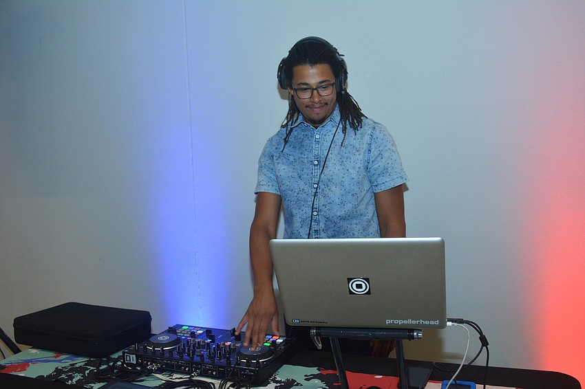 DJ Kuma set the mood for guests on the library's Jan Schmidt Terrace.