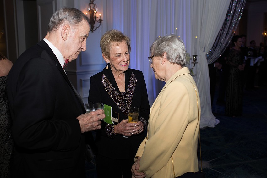 Jake and Barb Kiefer talk with Sister Lucia before stepping inside the Grand Ballroom of the Ritz-Carlton, Sarasota.