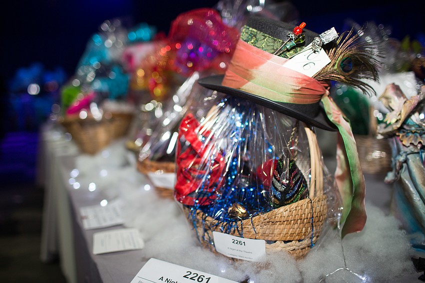 Gift baskets aligned the tables for the silent auction.