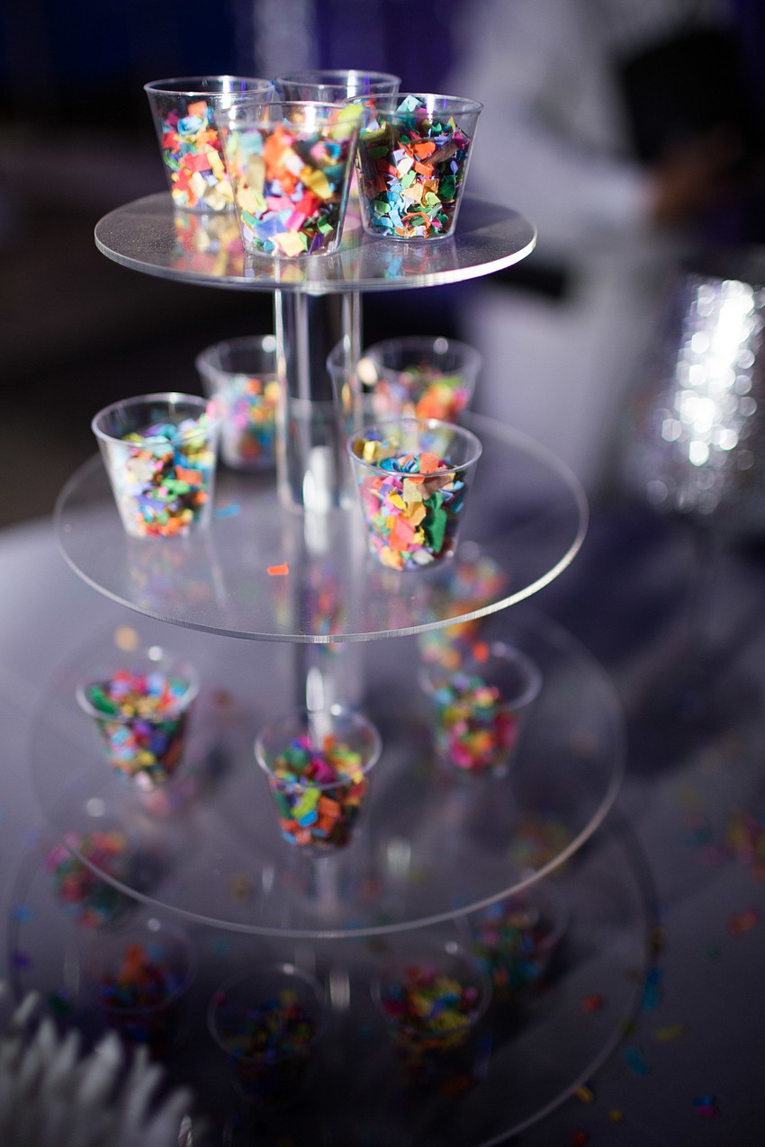 Confetti was thrown for the photo booth photos.