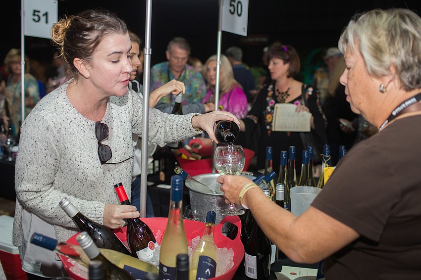 Maura Naughton pours a glass of wine from La Favorita.