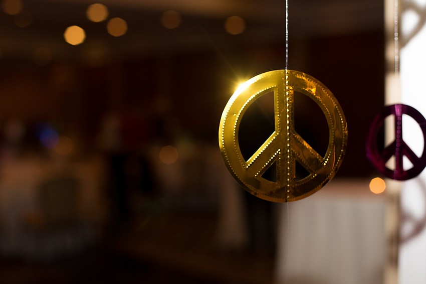 Peace signs were displayed around the ballroom.