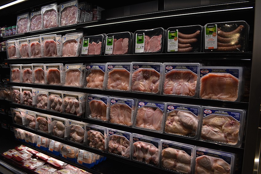 Even the chicken and pork is stacked at Whole Foods at University Station.