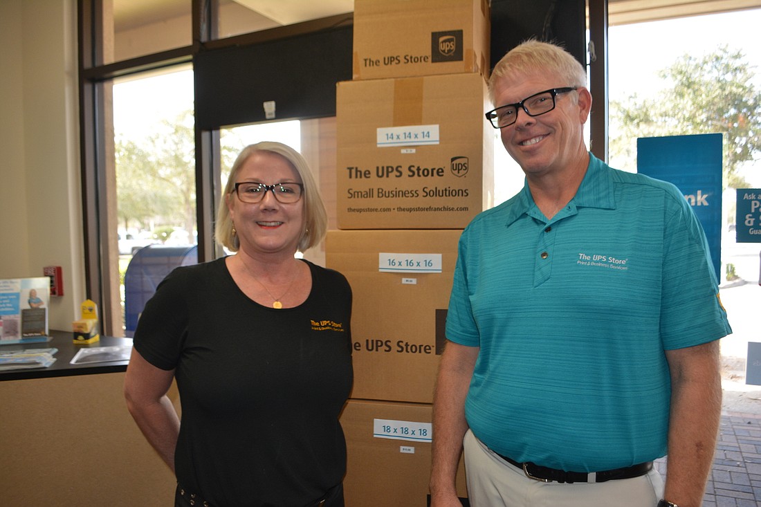 Manager Carla Ayres and owner Bob Wright have taken over a UPS franchise in Lakewood Ranch.