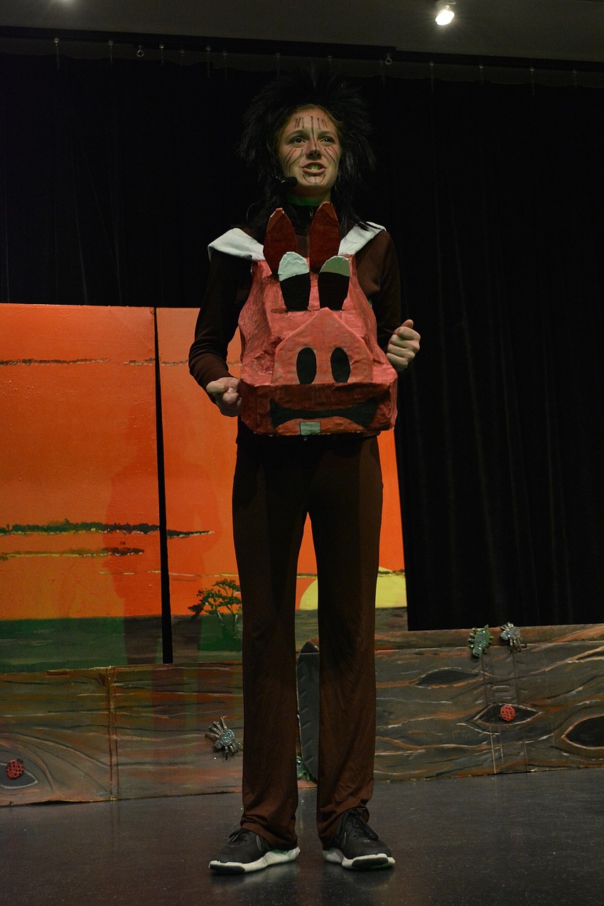 Hallie Monserez, as Pumbaa, sings about having 