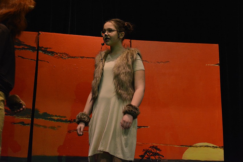 Nala, played by Alyssa Hamende, finds Simba. Amazed he is alive, she tells him his Uncle Scar has devastated the Pridelands and there is no food left.