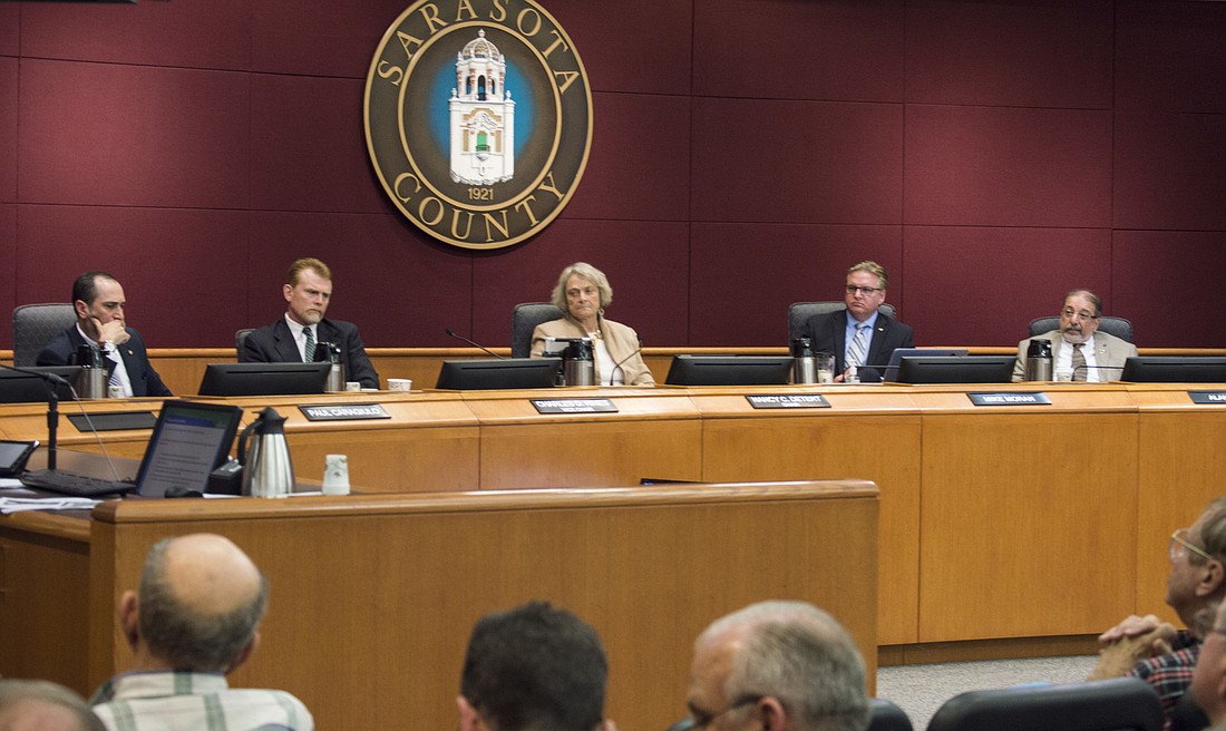 The County Commission approved $5.4 million in cuts on Jan. 31.