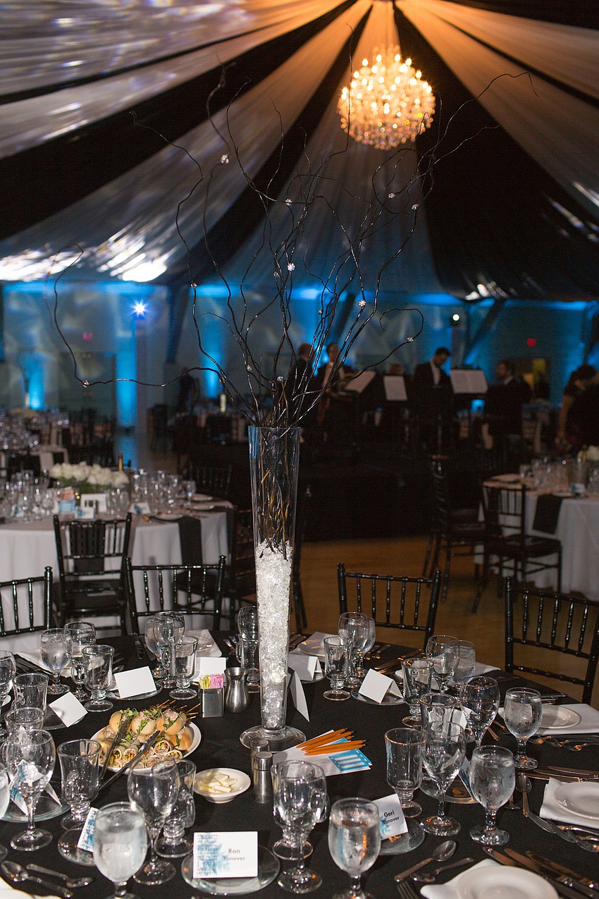 The centerpieces varied between tall vases and short roses.