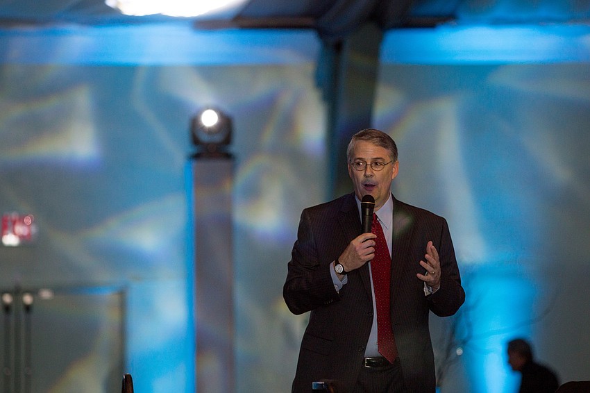 President and CEO of the Sarasota Orchestra, Joseph McKenna gives his opening remarks before dinner is served.