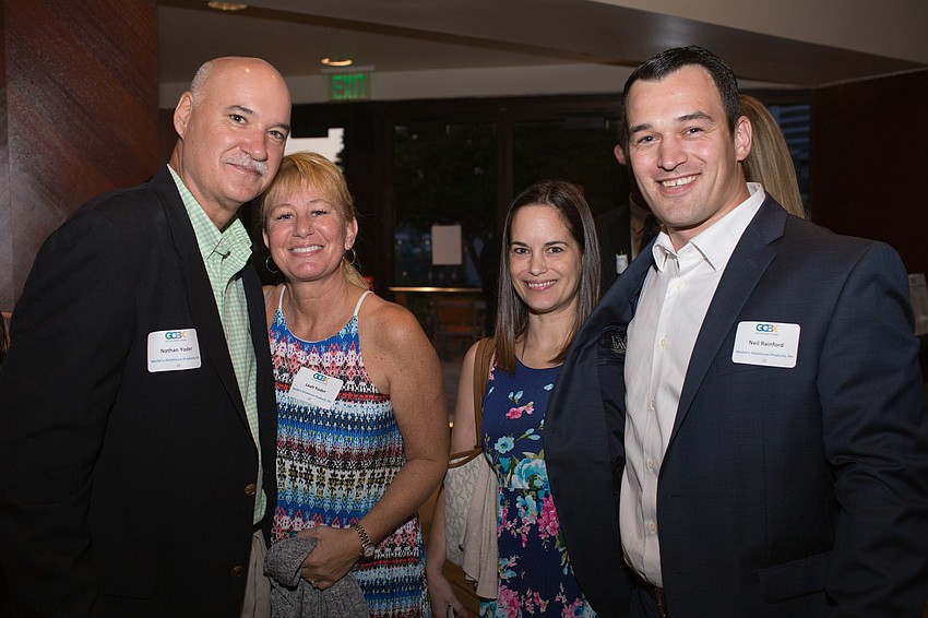 Nate and Leah Yoder with Amy and Neil Rainford.