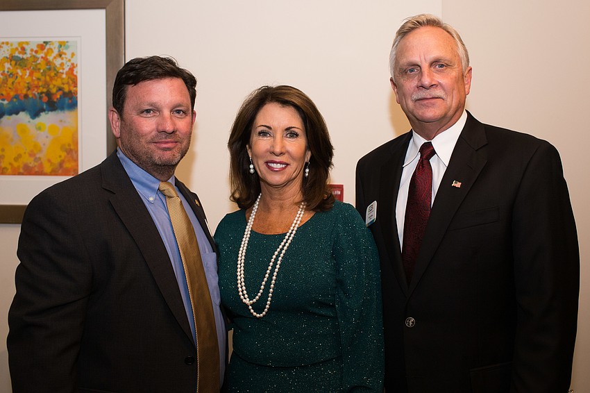 Incoming Chairman Brian Leaver, Executive Director Mary Doughtery and Outgoing Chairman Kevin Hicks