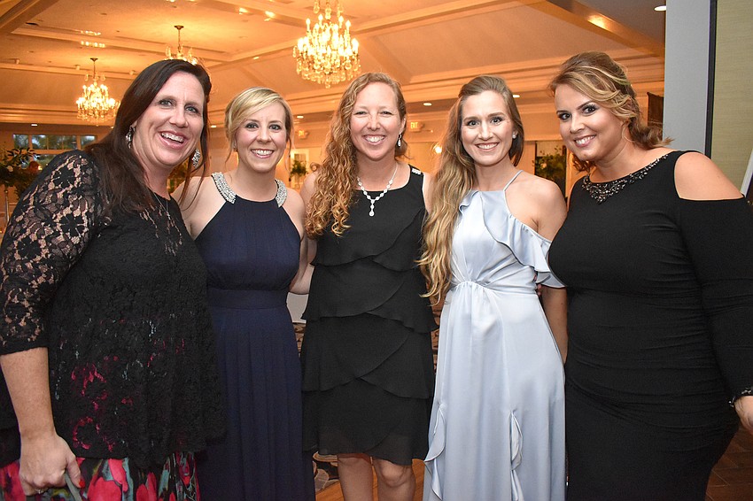 Joetta Troyer, Stephanie Yoder, Heather Helms, Beth Schaub and event chairwoman Candice Carr